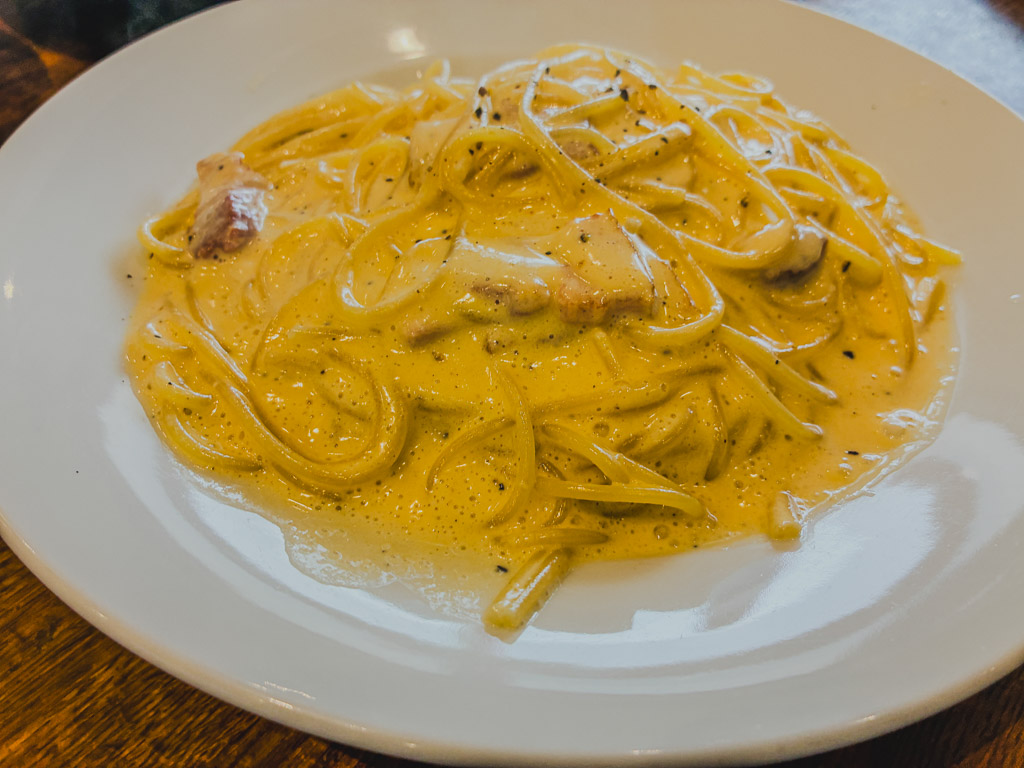 Capricciosa carbonara cream pasta bacon black pepper