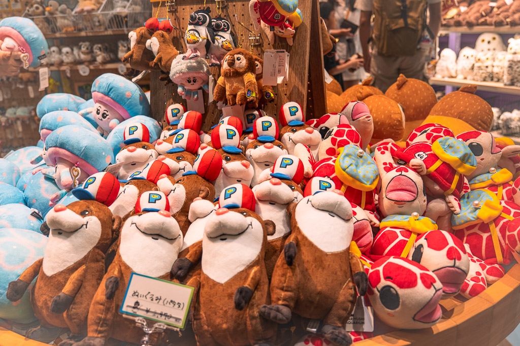 DMM Kariyushi Aquarium gift shop with otter and tortoise plush toys