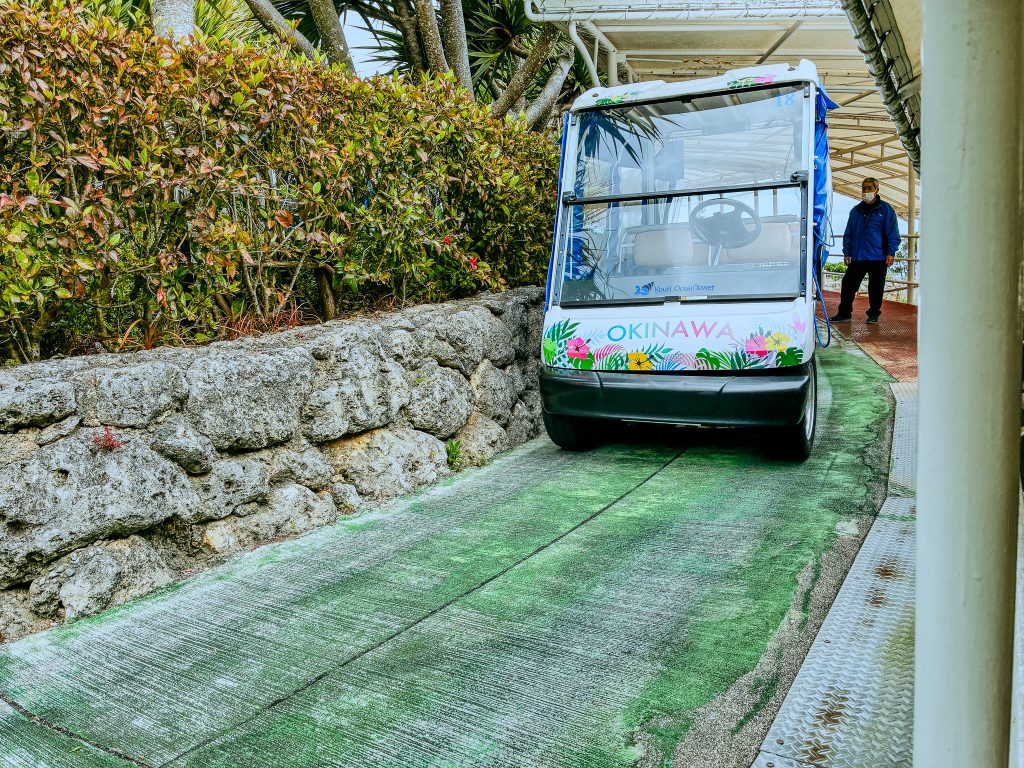 Kouri Ocean Tower autonomous self-driving electric cart with OKINAWA graphics