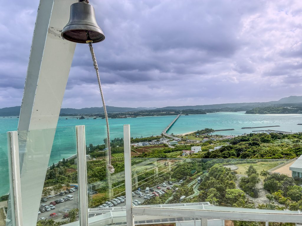 Heart Bell at Kouri Ocean Tower with Kouri Bridge in the background