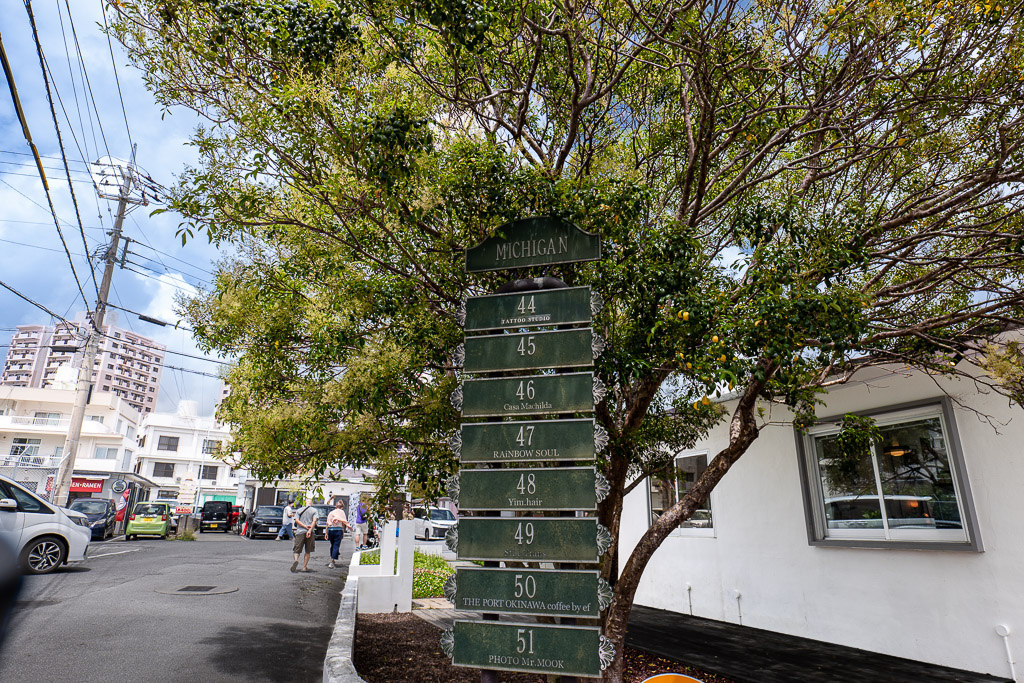 港川 (Minatogawa) MICHIGAN block signboard, shops 44–51 — RAINBOW PLATE THE PORT OKINAWA PHOTO JOURNEY