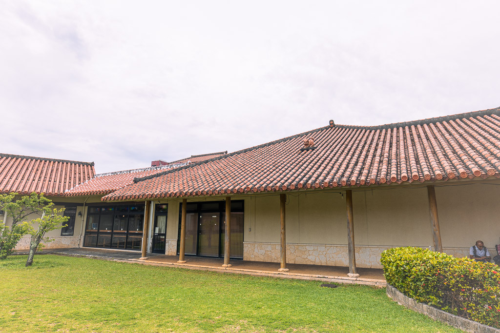 Ryukyu Kingdom Village — 100-year-old houses with red-tile roofs and wooden colonnade