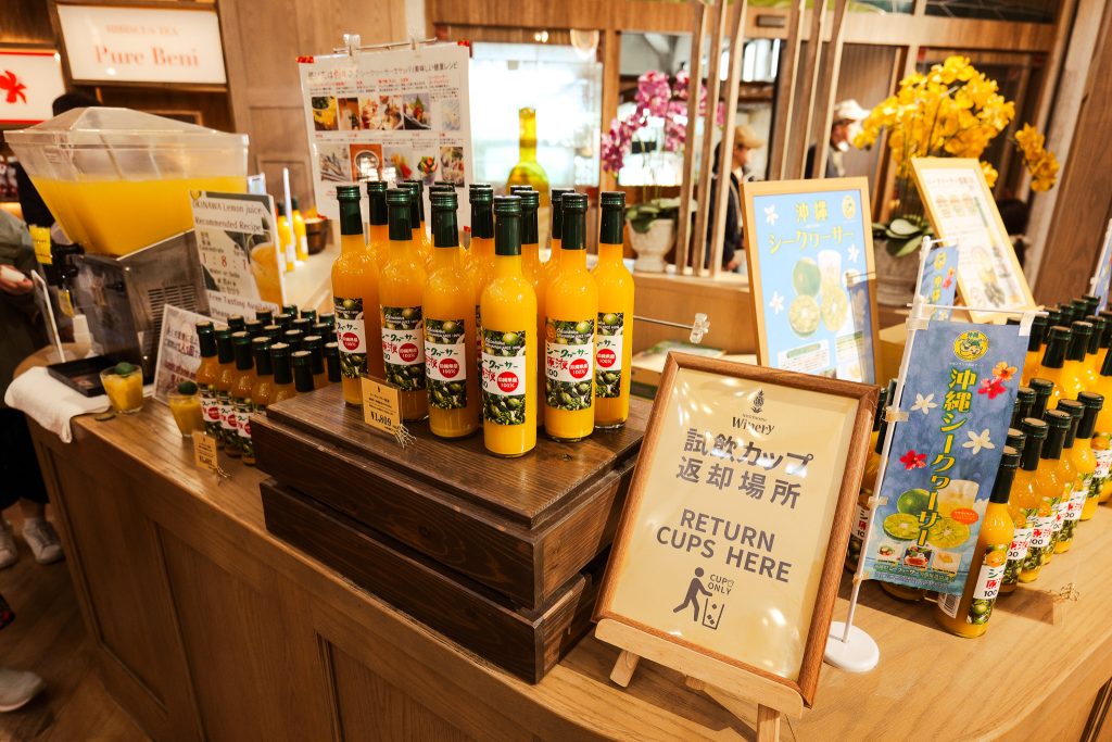 Pineapple wine and shikuwasa juice tasting at Nago Pineapple Park