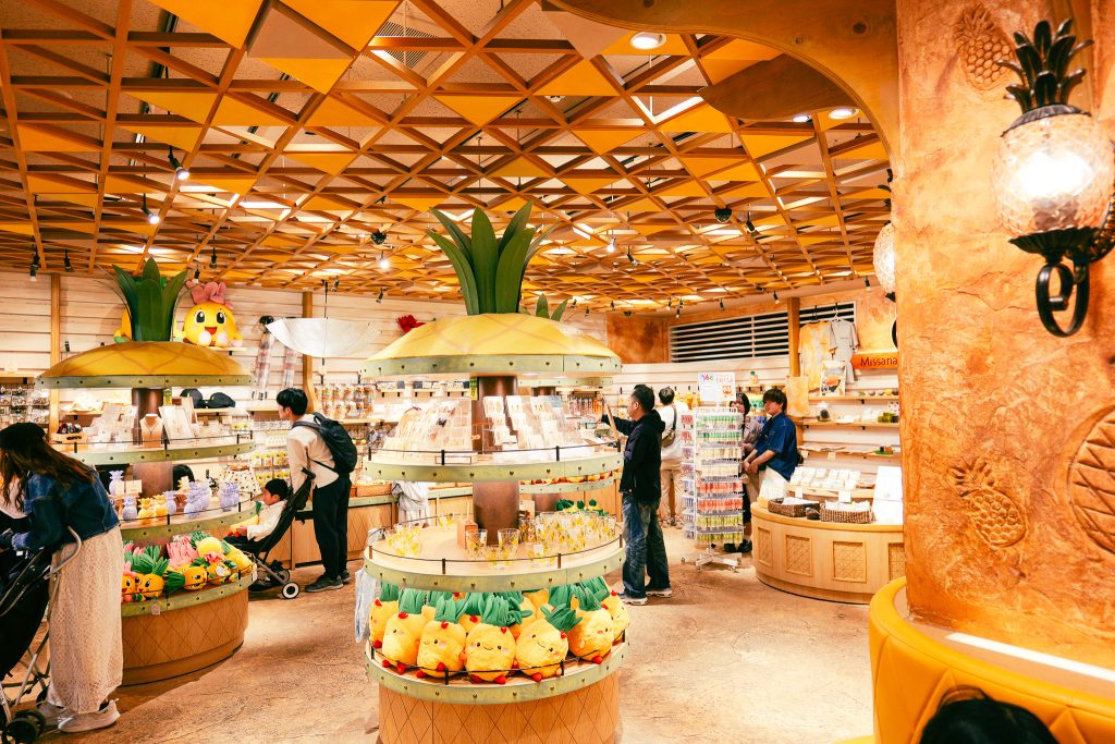 Pineapple Park souvenir shop with pineapple-themed ceiling and goods