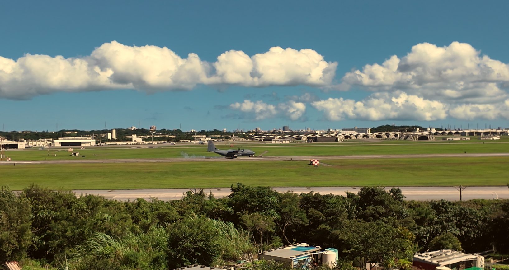 Fighter jet accelerating down the runway for takeoff at Kadena Air Base