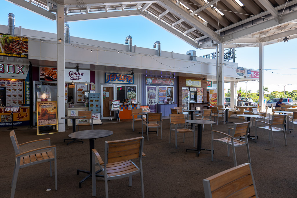 Open-air food court at Michi-no-Eki Kadena with taco rice, fried chicken and Okinawa soba stalls