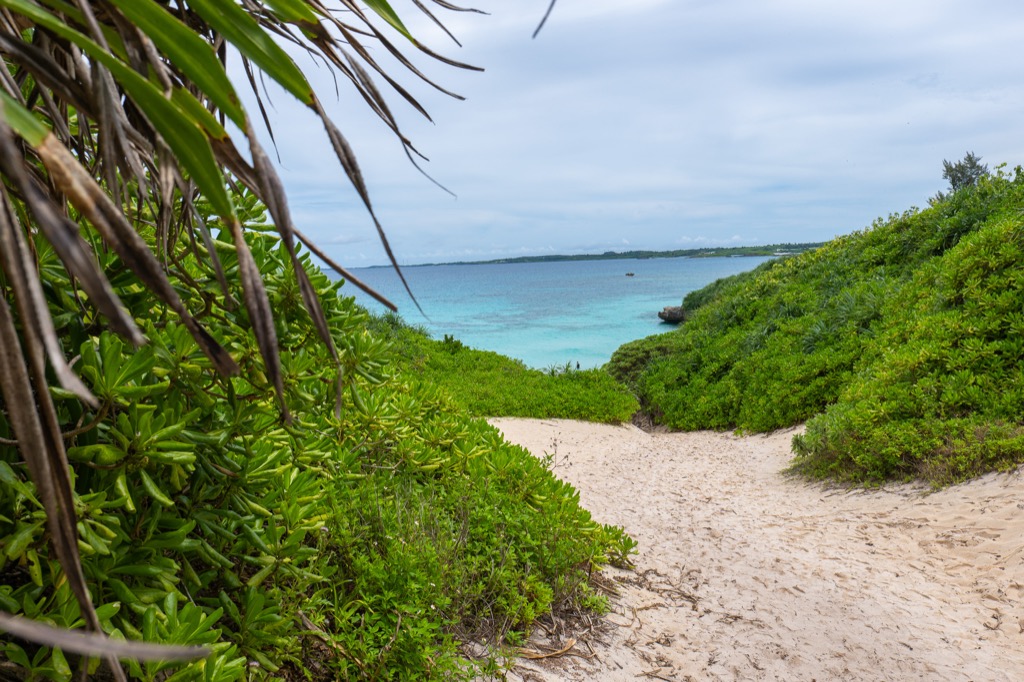 View over the dune at Sunayama Beach with turquoise Miyako Blue bay spreading out below