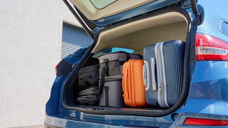 Loading luggage into an Okinawa rental car