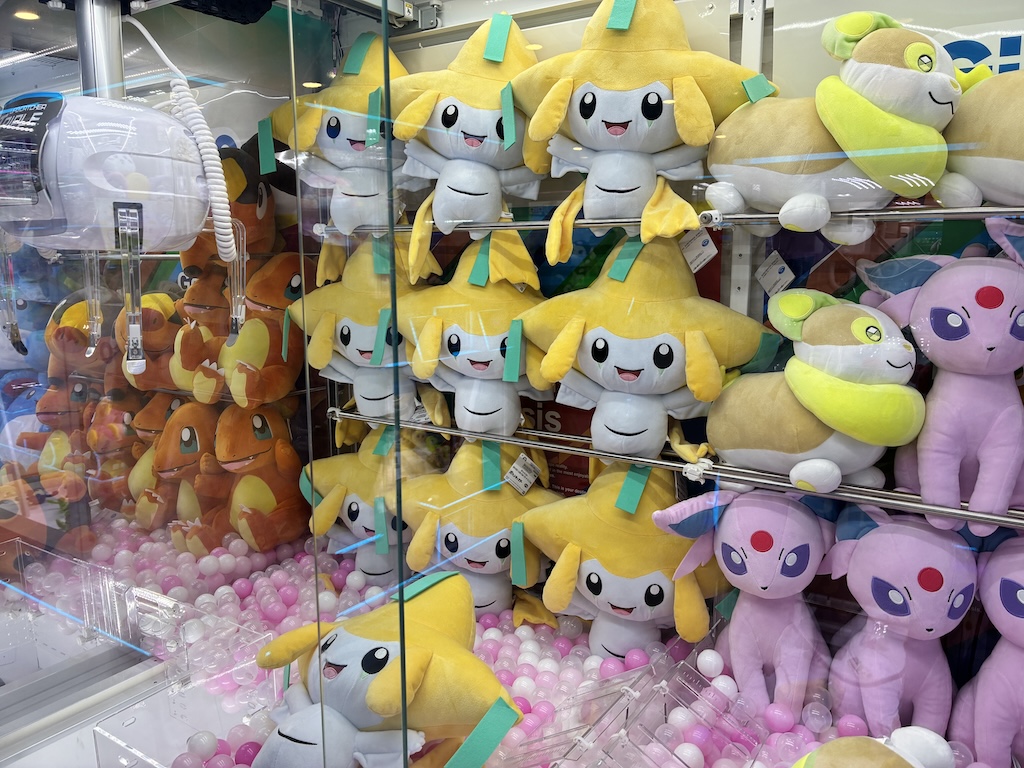 Indoor Pokemon claw-crane arcade game in Naha — a perfect typhoon-day backup activity when outdoor Okinawa sightseeing is suspended