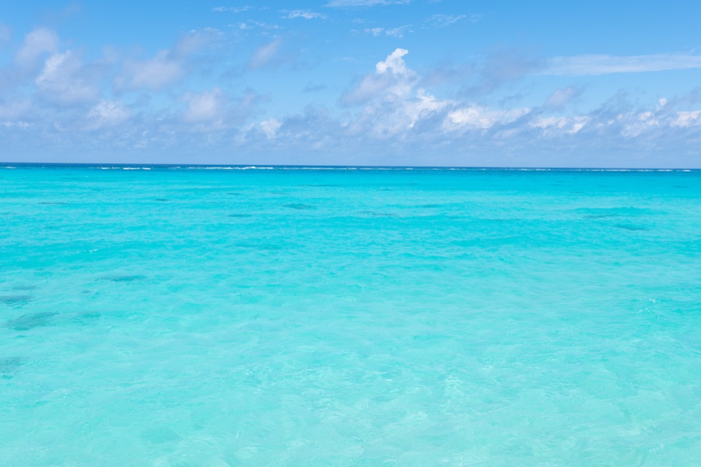 Turquoise reef water of Miyako Island — the kind of scenery waiting just minutes from MMD airport