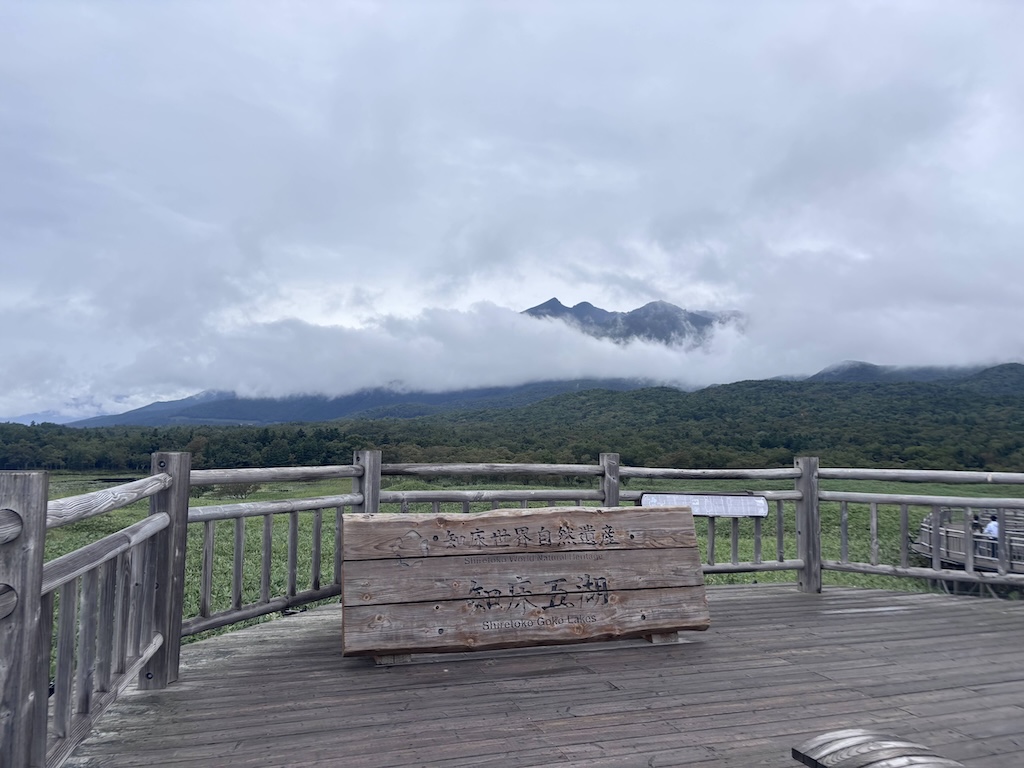 Shiretoko Goko five lakes viewing platform in Hokkaido during September weather, clouds wrapping the Shiretoko mountain range