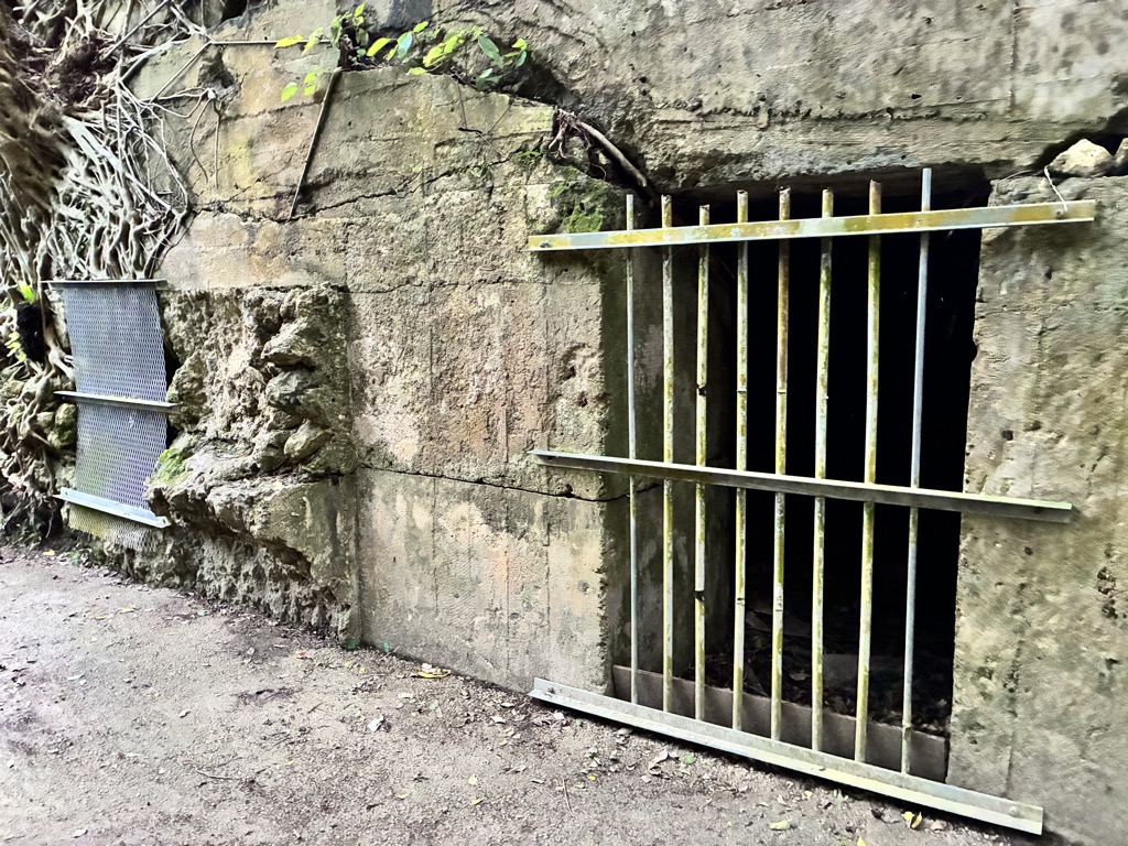 Barred entrance to the 32nd Army Headquarters Shelter tunnel