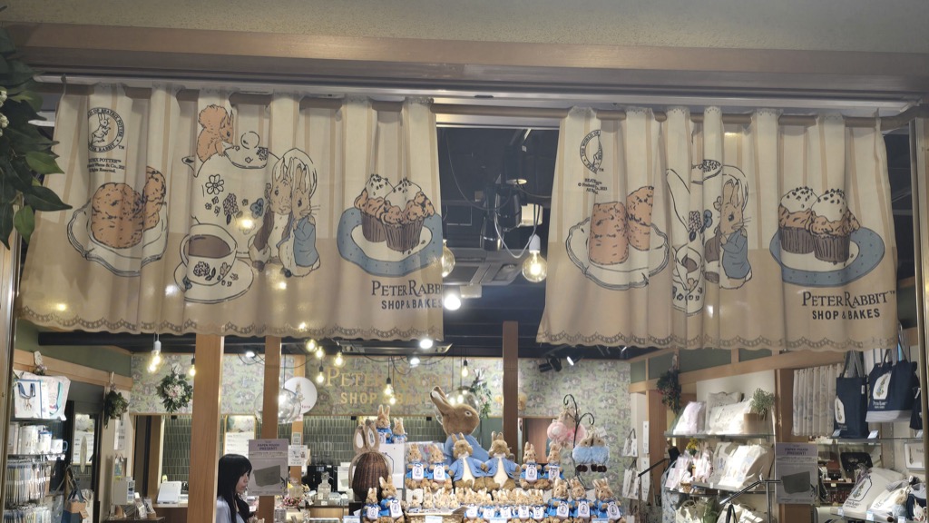 Peter Rabbit Shop and Bakes Kyoto storefront with English-style curtains and character bakes displayed